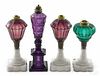 Four New England pressed glass fluid lamps, mid