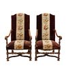 Par de sillones. Francia. Siglo XX. Estilo Luis XIII. En talla de madera de nogal. Con respaldo cerrado y asiento en tapicería.