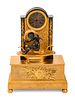 A Louis Philippe Gilt and Patinated Bronze Mantel Clock