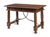 A Spanish Baroque Style Walnut Trestle Table