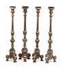 A Set of Four Northern European Gilt and Silvered Wood Candlesticks