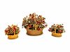 Three Gilt Metal and Enamel Flower-and-Basket Ornaments