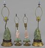 Two pairs of Chinese carved quartz table lamps,