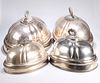 ^ TWO PAIRS OF SILVER-PLATED MEAT COVERS, each pair with en
