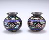 A SMALL PAIR OF SILVER AND ENAMEL VASES, each globular body