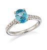 AN 18CT WHITE GOLD AQUAMARINE AND DIAMOND RING, an oval-cut