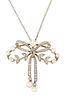 A BELLE EPOQUE DIAMOND AND PEARL PENDANT ON CHAIN, a centra