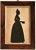 Standing Silhouette of a Woman with Book