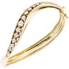 14K YELLOW GOLD DIAMOND BRACELET Rigid. Box clasp with 8-shaped safety. Weight: 23.5 g. Length: 6.1" (15.7 cm)