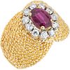 RING WITH RUBY AND DIAMONDS IN 18K YELLOW AND WHITE GOLD Weight: 13.1 g. Size: 6 ½ 1 Faceted cut oval ruby ~ 0 ....