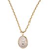NECKLACE AND MEDAL IN 14K YELLOW GOLD AND SILVER Necklace in 14K gold. Box clasp with 8-shape safety. Length: 50.2 cm.