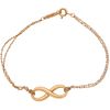 18K YELLOW GOLD BRACELET FROM THE FIRM TIFFANY & CO. TIFFANY INFINITY COLLECTION Carabiner clasp. Weight: 3.2 g.