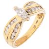 RING WITH DIAMONDS IN 18K YELLOW GOLD Weight: 5.1 g. Size: 6 ¾ 1 Marquise cut diamond ~ 0.20 ct Clarity: ...