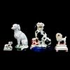 Four (4) Porcelain Dog Figurines