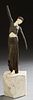 French Style Art Deco Bronze and Ivory Dancer, 20th c., on a geometric figured marble back, H.- 14 1/2 in., W.- 3 3/4 in., D.- 3 3/4 in. Provenance: f