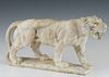 Carved Alabaster Lioness Figure, 20th c., with yellow glass eyes, on an integral base, H.- 7 3/4 in., W.- 16 in., D.- 3 1/2 in. Provenance: from the E