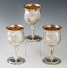 Set of Three Sterling Goblets, 20th c., by Reed and Barton, in the "Francis I" pattern, with repousse decoration and gilt washed interiors, each engra