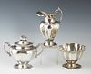 Three Piece Mexican Sterling Partial Coffee, 20th c., consisting of a creamer, covered sugar bowl and a waste bowl, Creamer- H.- 6 3/8 in., W.- 5 in.,