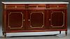 French Louis XVI Style Carved Mahogany Marble Top Sideboard, 20th c., the ogee edge white cookie corner marble, over three setback frieze drawers abov