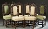 Set of Eight Continental Carved Oak Dining Chairs, c. 1880, the pierce carved arched backs with relief carved grape bunches, leaves and flowers, six w