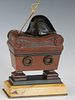 French Bronze Inkwell, 19th c., of Napoleon's Tomb, the interior gilt, with two covered inkwells with glass inserts, the lid with a Napoleon hat and a