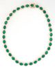 14K White Gold Link Necklace, each of the 35 links with prong set oval emerald atop a border of round diamonds, total emerald weight- 40.23 cts., L.- 