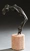 American School, "Nude Acrobat Bending Backward," 20th c., patinated bronze, unsigned, on a porous cylindrical pink stone base, Figure- H.- 9 1/4 in.,