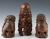 Group of Three Chinese Carved Bamboo Figures, early 20th c., consisting of a pair of Foo lions and a sage, Sage- H.- 12 1/2 in., W.- 5 in., D.- 7 in.