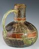 English Pottery Ewer, 19th c., with relief floral and fish decoration, H.- 10 1/2 in., W.- 9 3/8 in., D.- 8 1/2 in.
