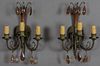Pair of Bronze Three Light Sconces, c. 1940, the circular back plate issuing a rod with three colored tear drop prisms, and three curved candle arms h