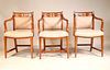 Three Carved Cherrywood Upholstered Armchairs