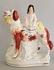 19th Century Staffordshire Figure of a Woman Riding a Dog