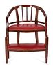 A Georgian Style Mahogany and Red Leatherette Library Chair
Height 30 x width 23 3/4 x depth 21 inches.