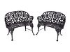 A Pair of Victorian Style Cast-Iron Garden Benches
Height 36 x width 37 inches.