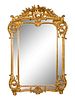 A Louis XV Style Giltwood Mirror
Height 57 x width 38 inches.