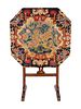 A Victorian Needlepoint-Mounted Tilt-Top Coaching Table
Height 42 x width 28 x depth 28 inches.