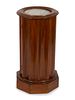 A Continental Mahogany Fluted Cylindrical Pedestal Cupboard
Height 28 1/2 x diameter 15 inches.