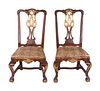 A Pair of Portuguese Rococo Parcel-Gilt Walnut Side Chairs
Height 36 inches.