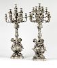 A pair of silvered candelabra, Maison Marnyhac