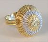 18 Karat Gold Ring 
with coiled dome top of white and yellow gold
size 7, 7.9 grams
Provenance: From the Lance & Irma Keller Collection, Bloomfield, C