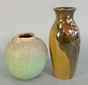Two Rookwood Pottery Vases
standard glazed with flowers and green matte glaze 1300
both marked for Rookwood
heights: 8 inches and 5 inches
Provenance: