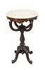 Round Victorian Stand with White Marble Top
on carved supports, set on four carved legs
height 30 inches, diameter 17 1/2 inches
Provenance: Matthes-T