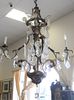 Continental Rococo Style Four-Light Chandelier
gilt metal, tole-painted and glass, having cage form
height 45 inches, diameter 36 inches
Provenance: T