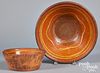 Two Pennsylvania slip decorated redware bowls