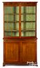 George III mahogany two-part bowfront bookcase