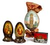 Three Russian painted eggs, together with a box