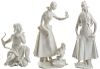 A GROUP OF THREE PORCELAIN FIGURES, TWO OF YOUNG LADIES AND ONE PUTTO, NYMPHENBURG, AFTER A MODEL BY PAUL SCHEURICH