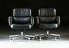 A PAIR OF MODERN "PALLADIUM" BLACK LEATHER SOFT PAD SWIVEL CHAIRS, BY THE BARRIT FURNITURE CORP., PHILADELPHIA, 1986,