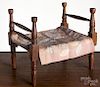 Maple doll rope bed, 19th c., 12 1/2'' h., 14 3/4'' l., together with an appliqué doll quilt.