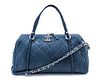A Chanel Iridescent Blue Quilted Relax Bowling Handbag, 14" x 6.75" x 9.5".